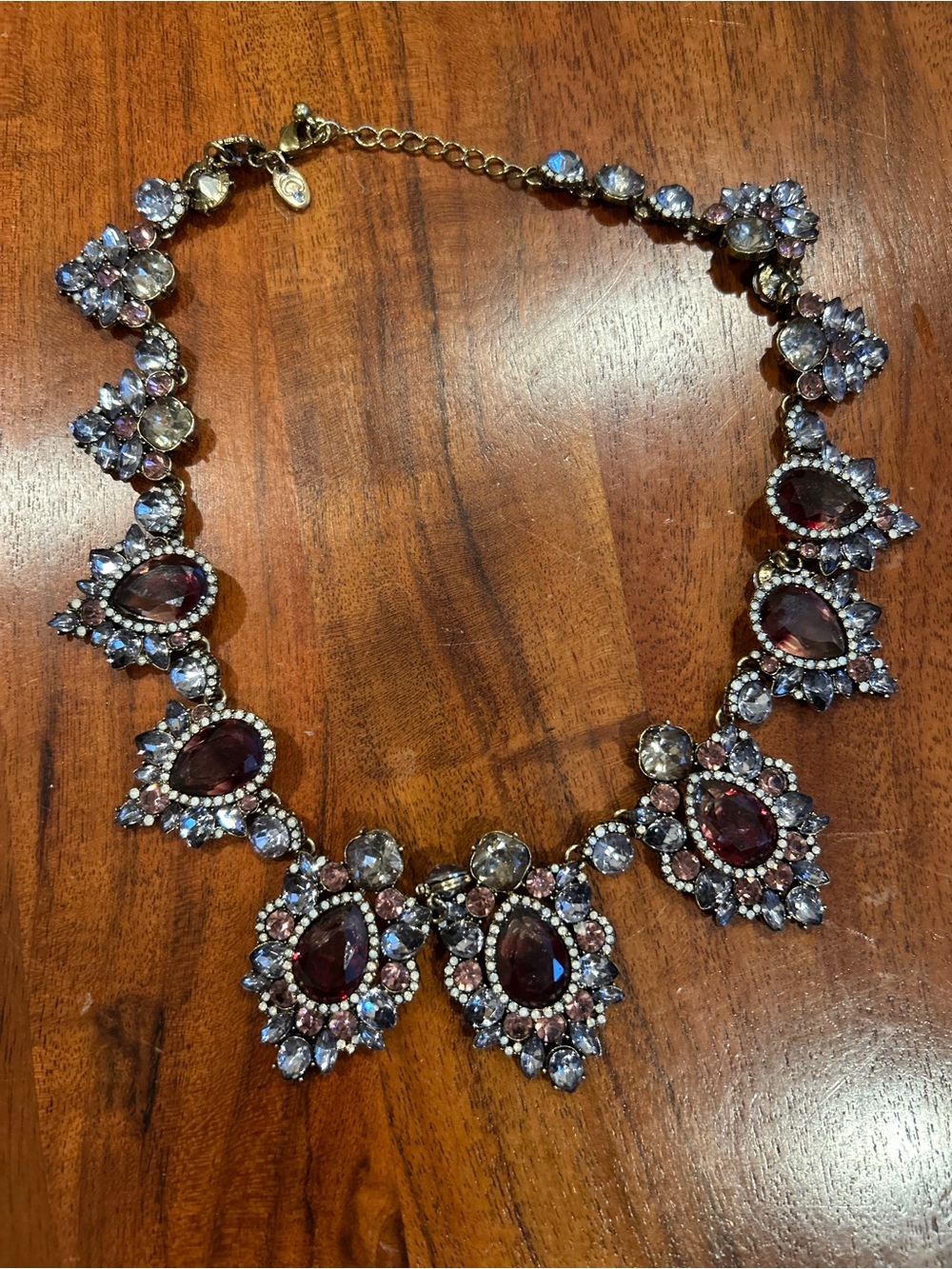 Vintage-style crystal bib statement necklace. large faceted burgundy stones.